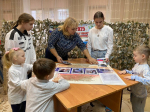 В Астраханском соццентре открыли стенд в честь героев СВО